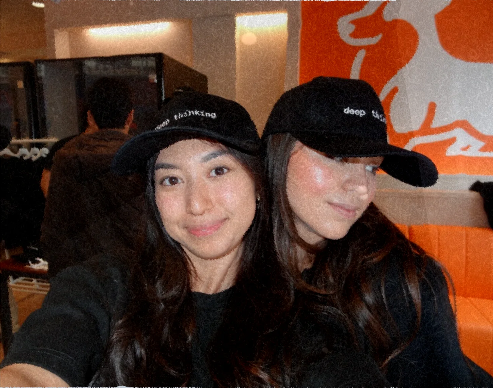 Two Corgi teammates in black hats